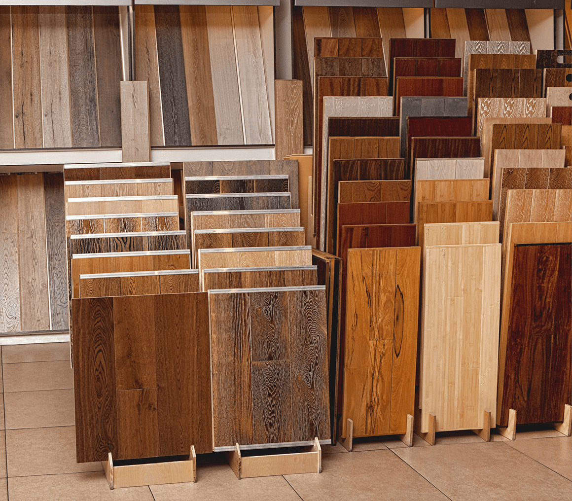 Various wooden flooring samples in showroom display.